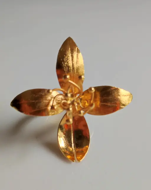 Anillo flor cuatro pétalos ajustable